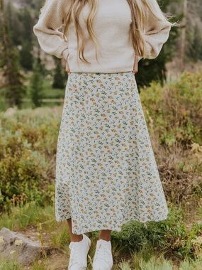 A-Line Midi Skirt - Light blue with Orange Print